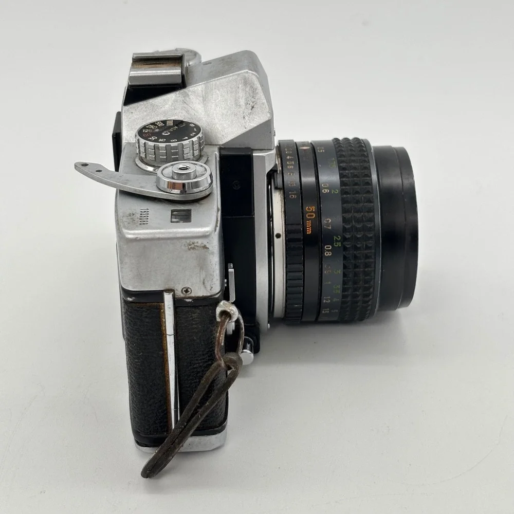 Minolta SRT 201 35mm SLR Film Camera with MC Rokkor-X PF 50mm f1.7 Lens Silver